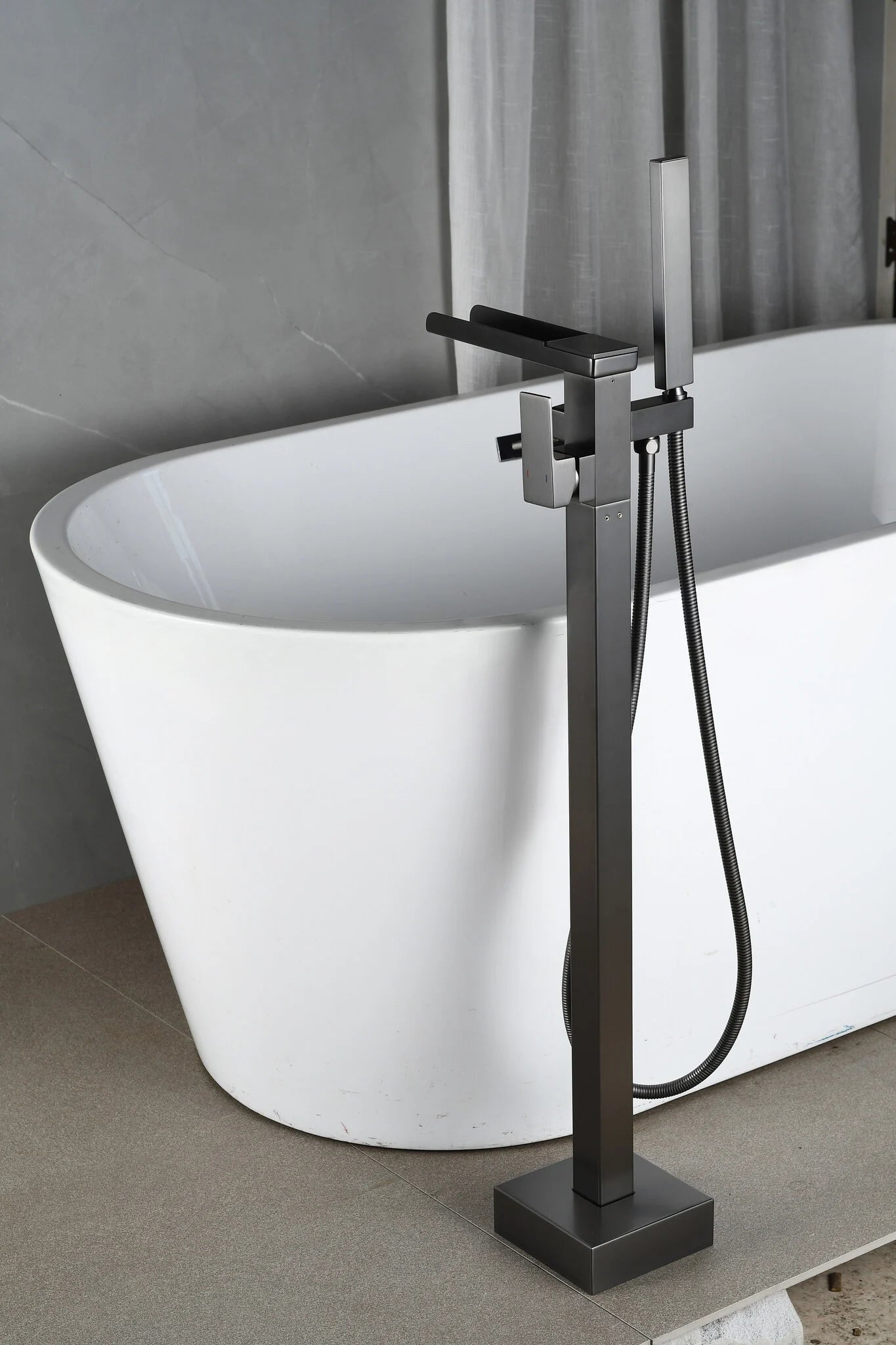 Freestanding bath mixer tap